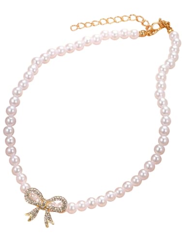 Pearl Necklace with Crystal Bow Pendant