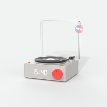 Wireless speaker and alarm clock with integrated display, compact design, and easy-to-use controls for versatile audio playback and time management