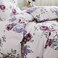 Luna Home King size 6 piece bedding set, white bed linen with purple floral pattern.