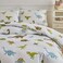 Luna Home Single size 4 piece bedding set with dinosaur pattern duvet cover.