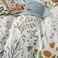 LUNA Home-King size 6 piece bedding set adorned with green leaves.