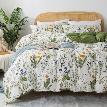LUNA Home-King size 6 piece bedding set adorned with green leaves.