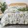 LUNA Home-King size 6 piece bedding set adorned with green leaves.