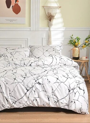 Home 6 piece queen size bed linen set in Scandinavian style with marble pattern.