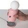 Wireless lamp and charger in pink with modern design, combines ambient lighting and convenient device charging for home d&eacute;cor spaces