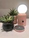 Wireless lamp and charger in pink with modern design, combines ambient lighting and convenient device charging for home d&eacute;cor spaces