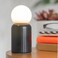 Mini wireless lamp with compact design and black finish ideal for modern home d&eacute;cor spaces portable and easy to use suitable for various settings provides ambient lighting solution
