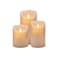Set of 3 flickering LED flameless candles with elegant wickless design&mdash;safe, stylish home d&eacute;cor.