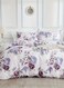 Home Queen size 6 piece bedding set, white bed linen with purple floral pattern.