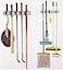 FITTO Wall Mounted Broom Holder – 5-Slot Organizer for Mops, Brushes, and Long-Handled Tools – Durable Plastic, Easy Installation with Screws Included for Home, Garage, Laundry, and More
