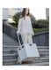 Compact and foldable this plastic trolley combines storage box and shopping cart functionalities offering a convenient and space saving solution.