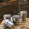AUTO FAMILY Stackable Stainless Steel Coffee Mug Set with Rack and Mesh Carrying Bag &ndash; 4 Durable Matte Black Steel Cups with Space-Saving Metal Stand &ndash; Ideal for Home, Office (Silver)