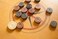 ULTIMAX Premium Wooden Carrom Coins with Striker   6mm Thickness   24 Carrom Coins + 1 Striker for Smooth Play