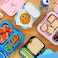 Zoku Neat Bento has compact design, Sof Touch handle, Adjustable containers and Leakproof. Has freezer pack, BPA Free and Dishwasher Safe, Blue