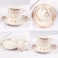 XIANGYU Dinner Set Porcelain Gold, 32pcs tea set; (12)pcs tea cup/saucer, (6) 10'5 flat plate, (6) 7'5 flat plate, (6) 6' salad bowl, (1) 6' salad bowl, (1) 14' oval plate. New Ceramic Bone China, The