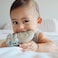 Itzy Ritzy Silicone Teething Mitt &ndash; Soothing Infant Teething Mitten With Adjustable Strap, Crinkle Sound And Textured Silicone To Soothe Sore And Swollen Gums, Sloth