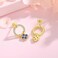 Golden-Toned 925 Sterling Silver Hoop Earrings with Blue Crystal Flower Charms