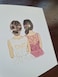 Bride and Bridesmaid in a pink dress.