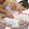 Teknum 6 - in - 1 Cozy Rocker Bassinet مع عجلات ومظلة وشبكة بعوضة - وردي