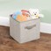 Mdesign Soft Fabric Closet Storage Organizer Bin Box - Front Handle, For Cube Furniture Shelving Units Bedroom, Nursery, Toy Room - Textured Print - Small, 2 Pack - Linen/Tan