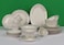 XIANGYU Dinner Set Porcelain Gold, 32pcs tea set; (12)pcs tea cup/saucer, (6) 10'5 flat plate, (6) 7'5 flat plate, (6) 6' salad bowl, (1) 6' salad bowl, (1) 14' oval plate. New Ceramic Bone China, The