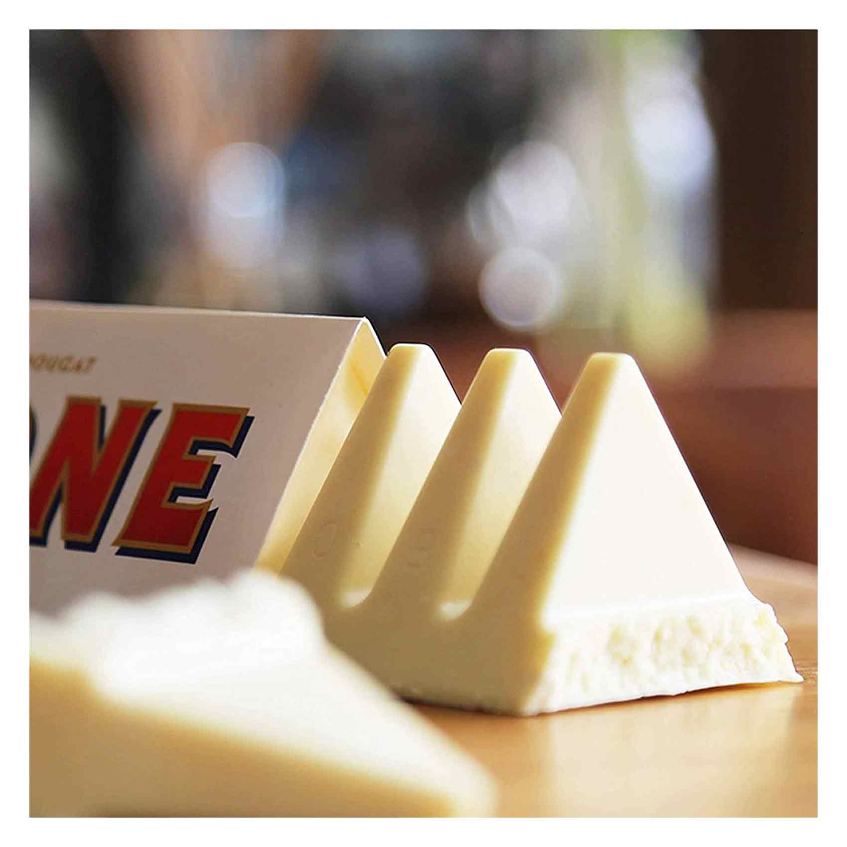 Toblerone White Chocolate Bar Swiss With Honey And Almond Nougat 100 Gram product thumbnail 6