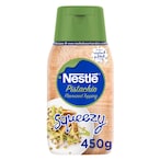 Buy Nestle Squeezy Pistachio Flavoured sweetened Condensed Milk Topping 450g in UAE